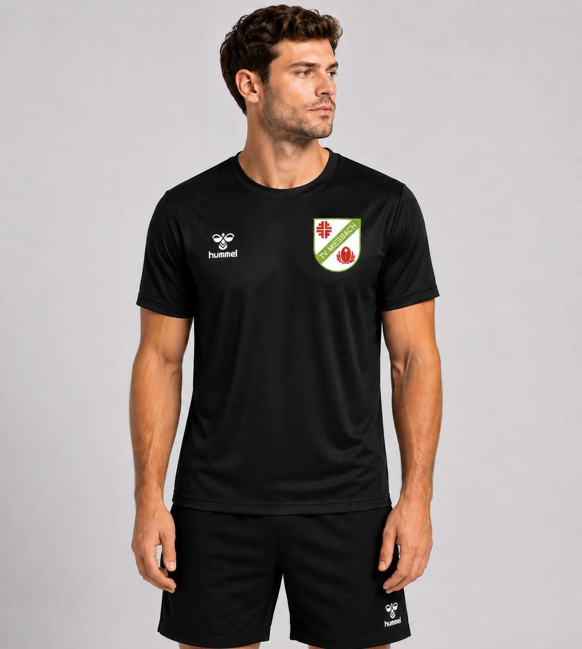 TV Miesbach Funktionsshirt schwarz vorne mit Logo von Hummel für Herren